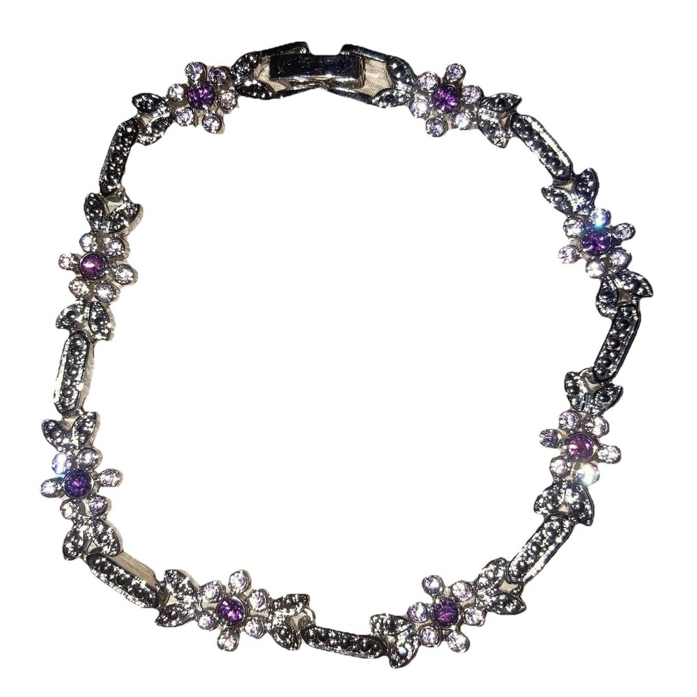 Floral Tennis bracelet with purple stones.